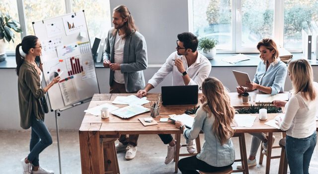 Sales,Report.,Top,View,Of,Two,Modern,Young,Colleagues,Conducting